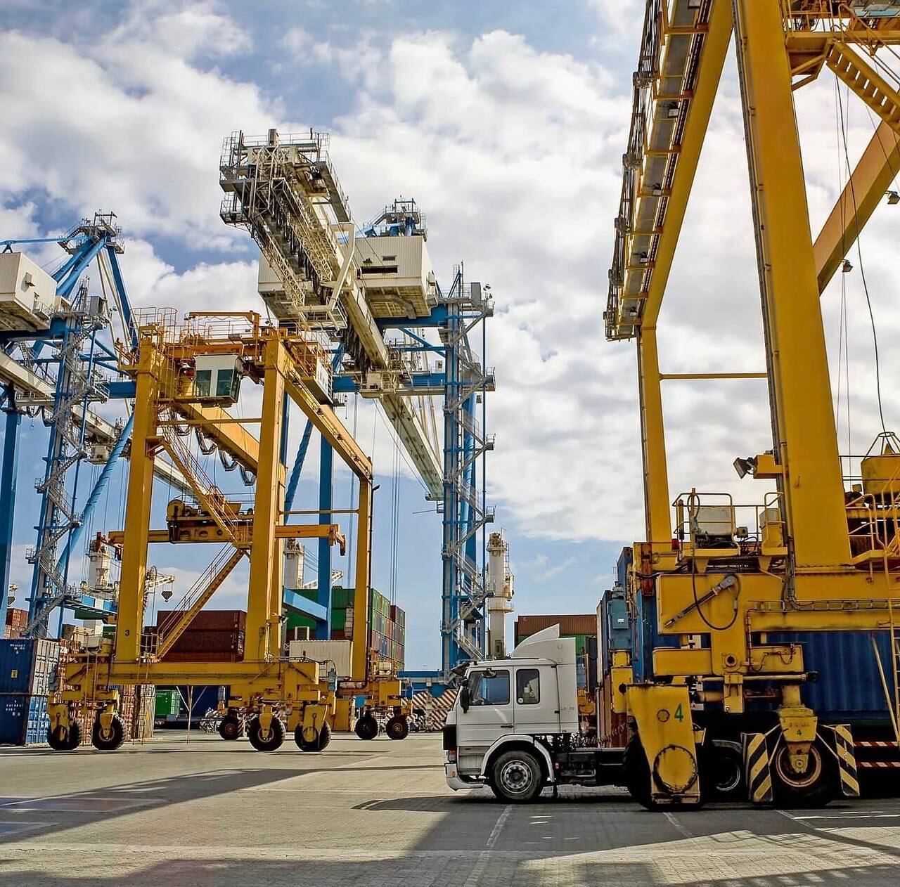 Heavy gantry cranes and equipment at a port facility
